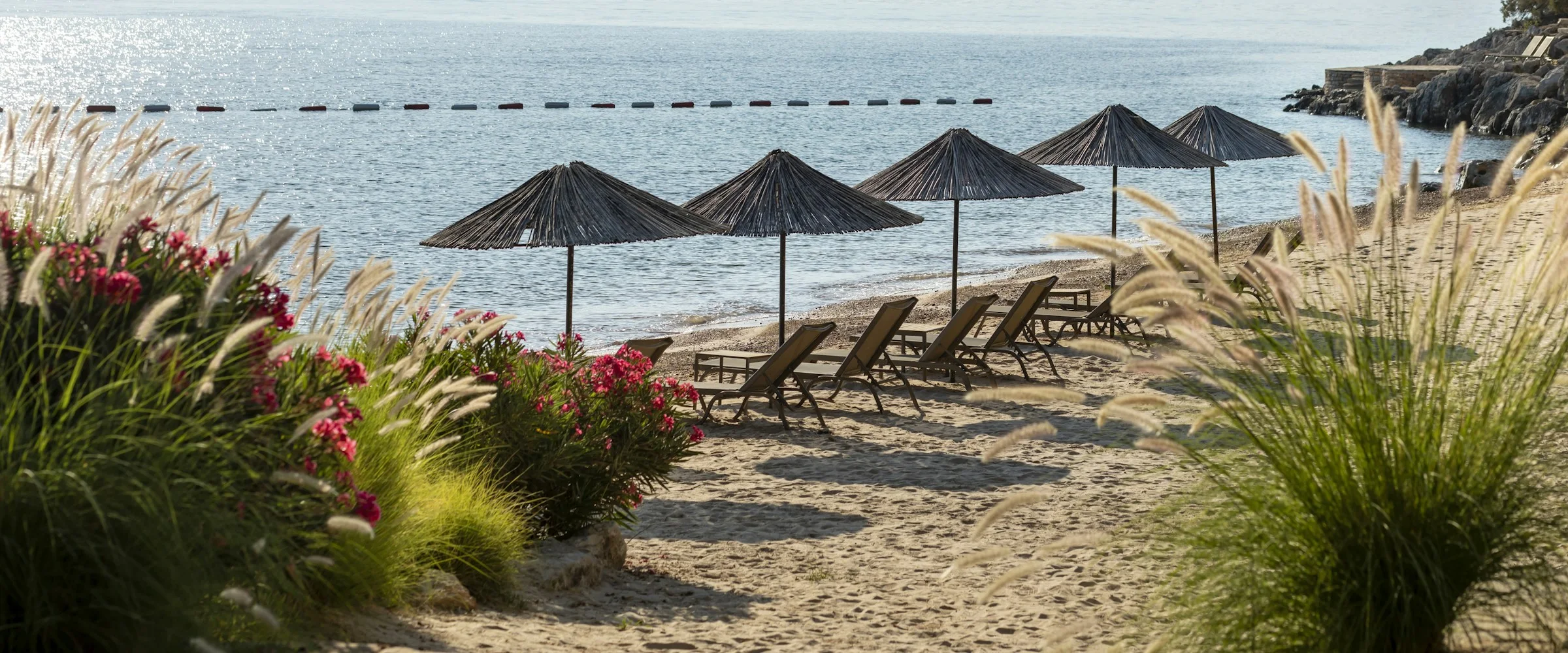 Beach with sun loungers in Bodrum
